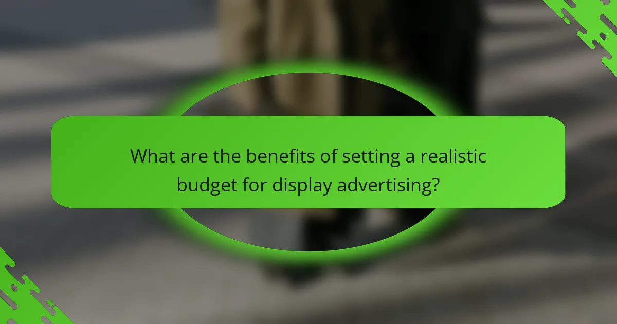 What are the benefits of setting a realistic budget for display advertising?